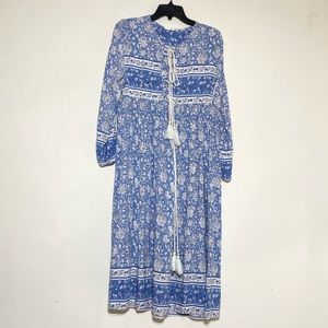 R Vivimos size medium, Bohemian, floral, blue tassels in front